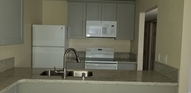 Building Photo - Condo Available Now