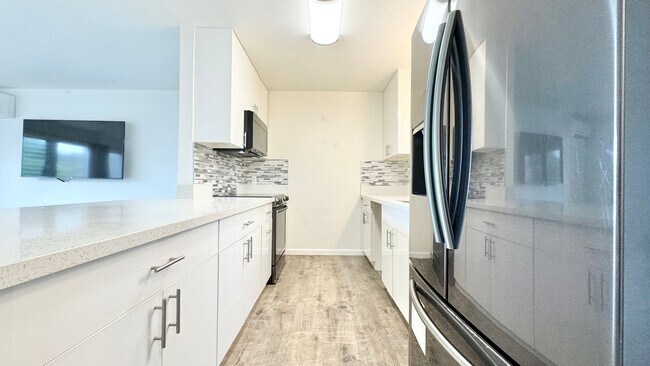 Building Photo - UPDATED 3 BEDROOM WITH 2 CAR GARAGE IN AIEA