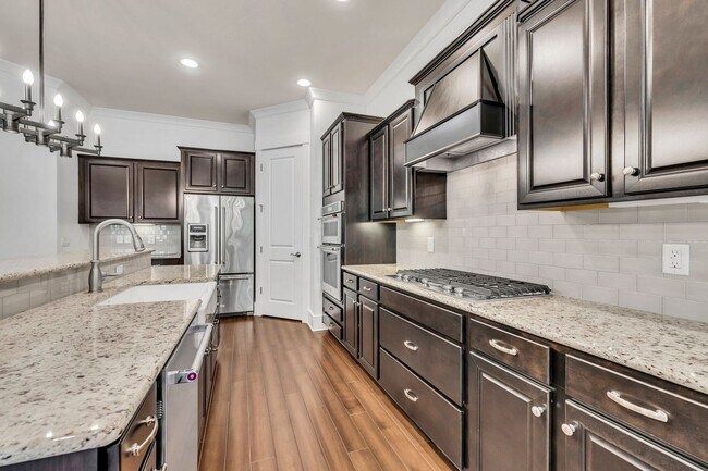 Building Photo - Beautifully maintained and move-in ready, this stunning mostly one-level all-brick home
