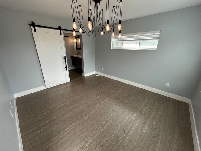 Building Photo - Modern 2 Bed, 2 Bath with Rooftop Patio!