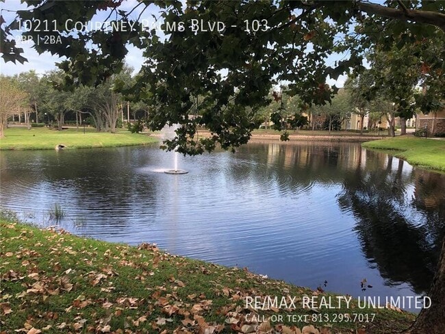 Building Photo - 10211 Courtney Palms Blvd