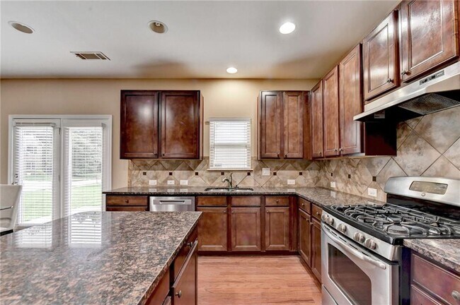 Building Photo - 4228 Woods Creek Ln