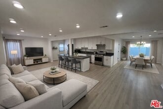 Building Photo - 10745 Saticoy St