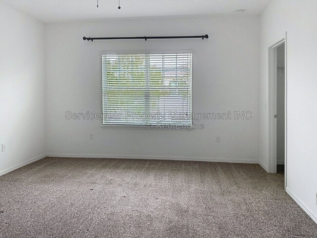 Building Photo - 9428 Woodcrane Dr