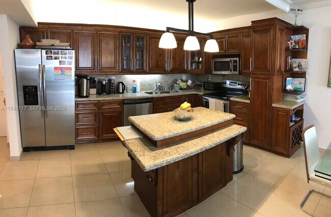 Building Photo - 19390 Collins Ave