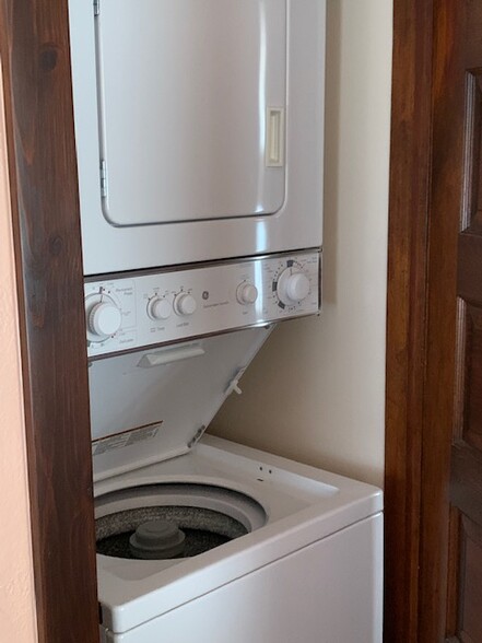Stackable washer/dryer in bedroom closet - 412 Carlisle Blvd NE