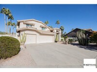 Building Photo - Discover your Dream Oasis in this 4/3 Phoenix Home, Nestled in the Exclusive Gated Shadow Rock golf