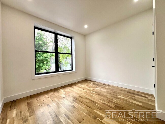 Building Photo - BRAND NEW 4 BED 2 BATH WITH W/D IN UNIT!