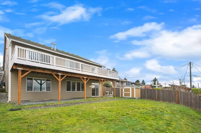 Building Photo - Water Views| Expansive Deck | Flexible Living Spaces