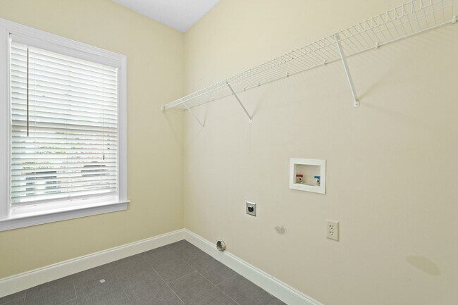 Building Photo - 3 Bedroom Dunham Marsh Beauty with Outdoor Fireplace and Resort-Style Community Amenities