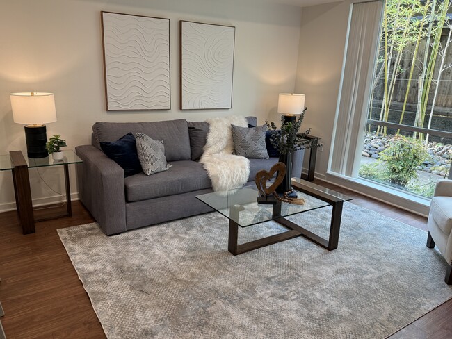 A roomy and inviting living room. - 1655 N California Blvd