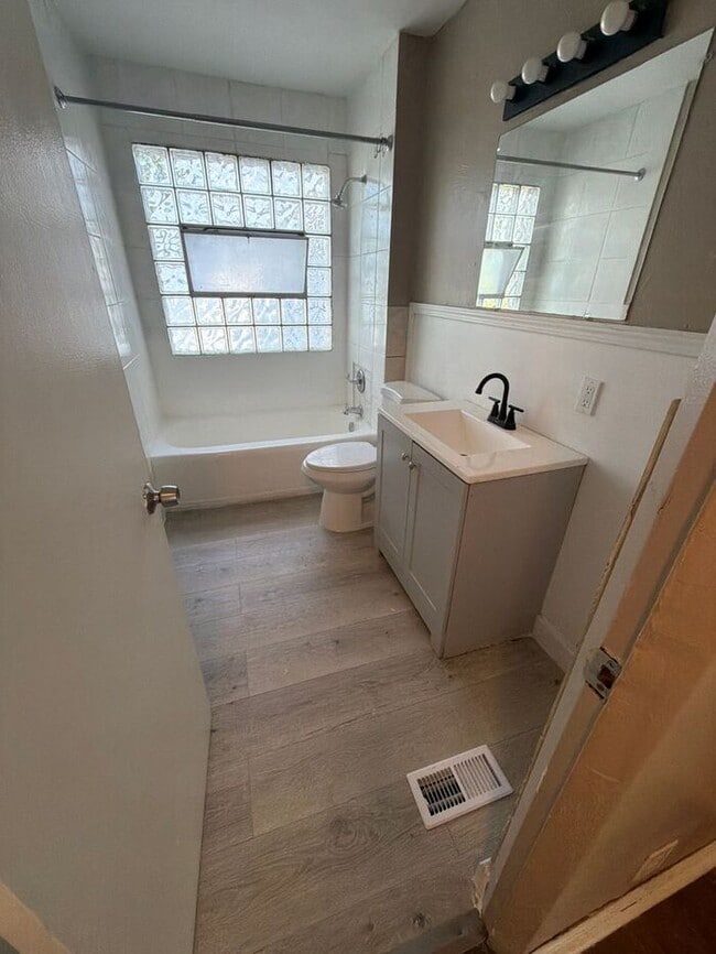 Building Photo - Spacious 4-Bedroom Home with Garage & Breezeway