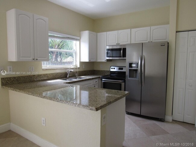 Building Photo - 14030 SW 51st Ln