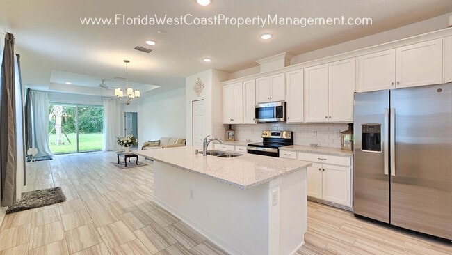 Building Photo - OUTSTANDING SUMMERWOODS -PARRISH 3 BEDROOM...