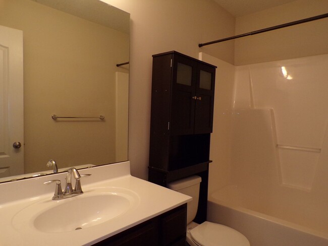 Building Photo - Two Bedroom Townhome located in the Burrou...