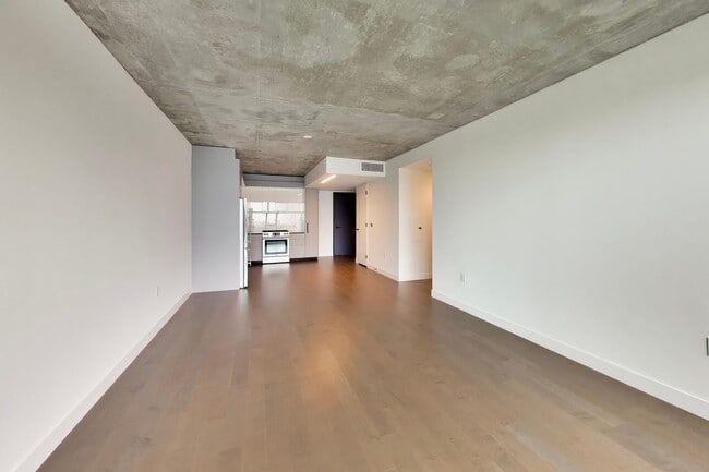 Building Photo - Urban Luxury at SoMa Serif Condos 2BR/2BA | In-Unit Laundry & 24-Hour Security