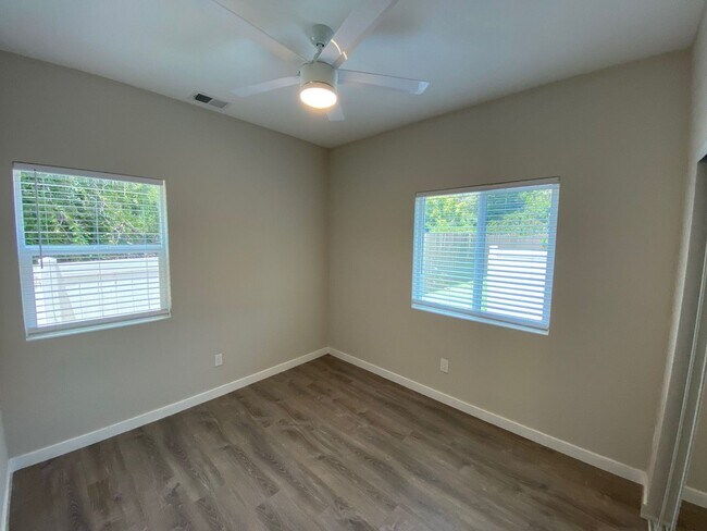 Building Photo - NEW (2023) 4BD/2BA!! Back gate exits right...
