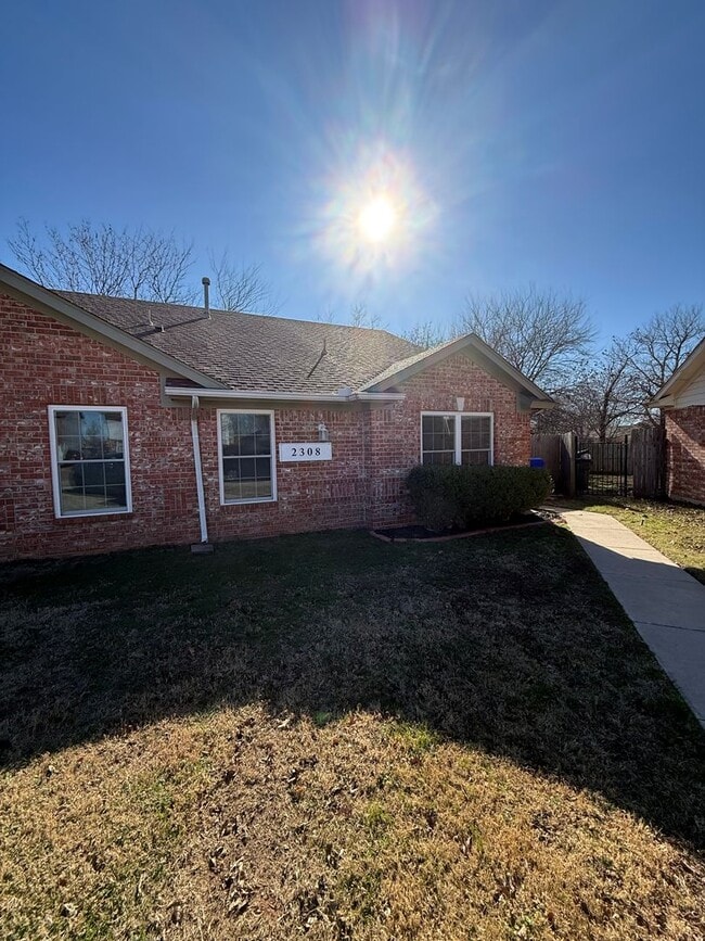 Building Photo - 4 Bedroom - 2 bath duplex located near campus and State Highway 9