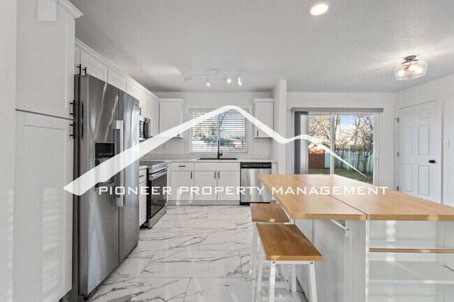 Building Photo - Stylishly Renovated Home with Enclosed Fence, AC and 1 Car Garage