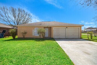 Building Photo - Lovely 4 Bedroom 2 Bath 2 Car Garage home with Large, Privacy Fenced Backyard!! Fresh Paint, Cera...