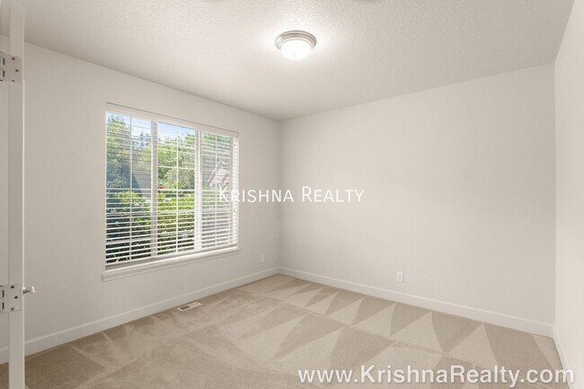 Building Photo - 13470 NW Alvada St