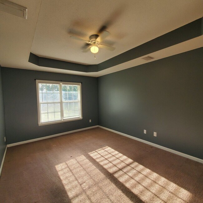 Building Photo - Tranquil Oasis: Spacious 4BR Home with Mod...