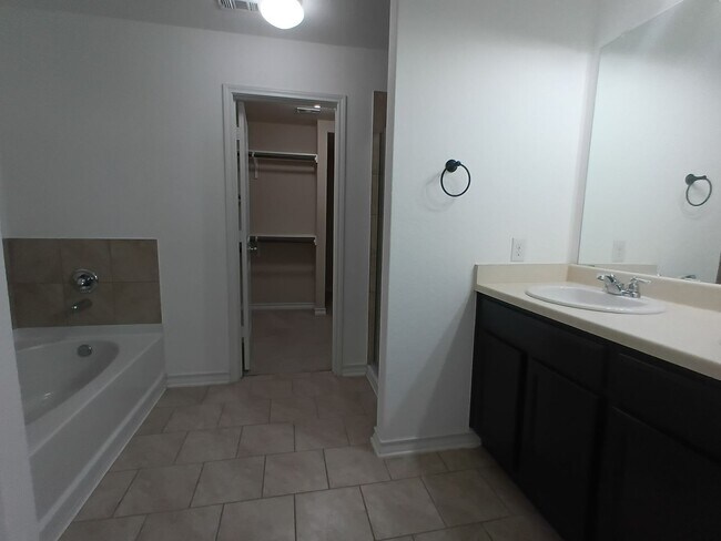Building Photo - Spacious 4-Bedroom Home with Washer & Dryer Included in Riposa Vita Community!