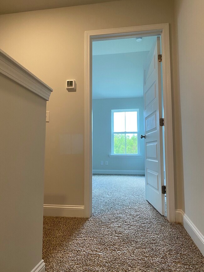 Top of stairs looking into the MBR - 78 Horizon Ln