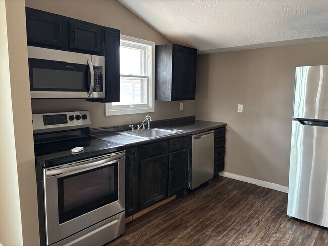 Building Photo - Ask About our Move in Special! Charming 3 Bed 1.5 Bath Home With Fenced Yard