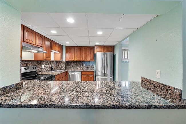 Building Photo - 3200 Coral Springs Dr