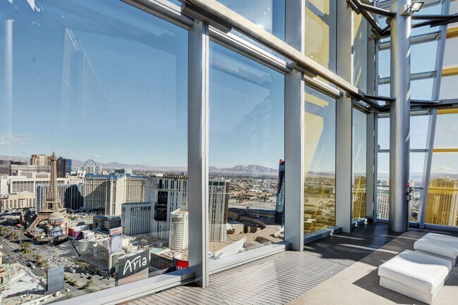 Building Photo - Stunning Strip Views from this Fully Furnished Studio Residence.