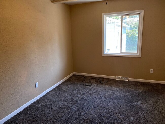 Building Photo - Check Out This Huge 4-Bedroom House!