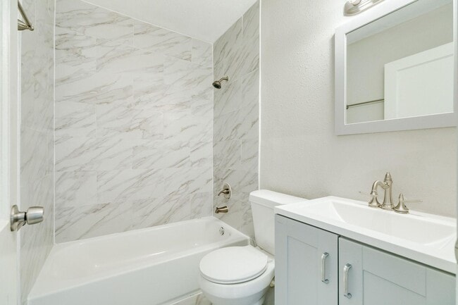 Building Photo - Recently Renovated 4-Bedroom Home with Mod...