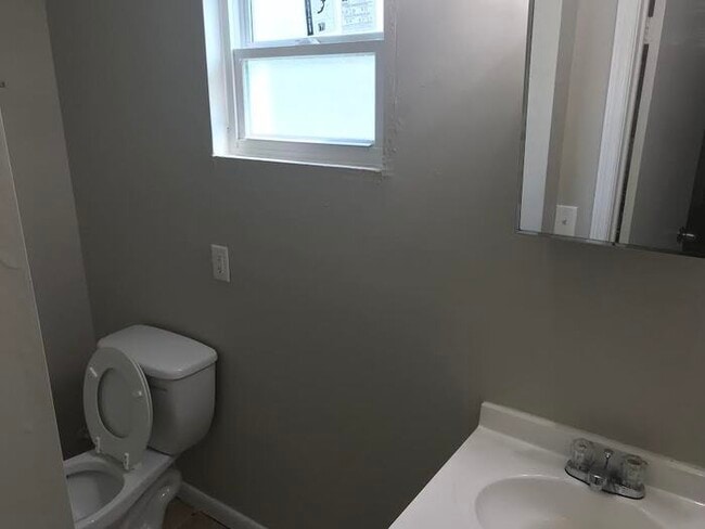 Building Photo - Spacious 4 Bedroom Home With Garage And Modern Updates