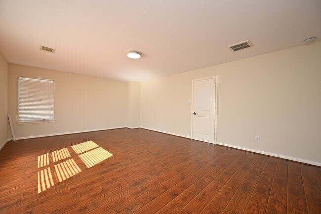 Building Photo - 9403 Coatsworth Dr