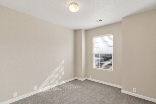 Building Photo - Charming 3-Bedroom Home Near Ft. Carson – ...
