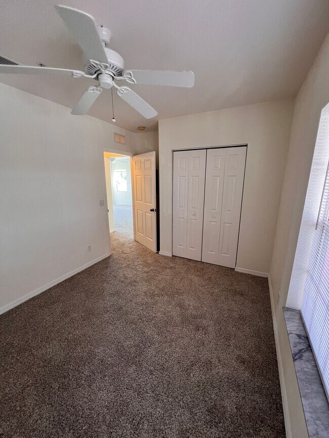 Building Photo - Annual Unfurnished Rental – 3 Bed, 2 Bath Condo in Gated Community!