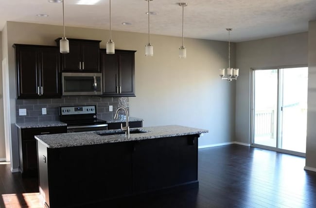 Building Photo - Fenced in 4 bedroom home with Second Living Space