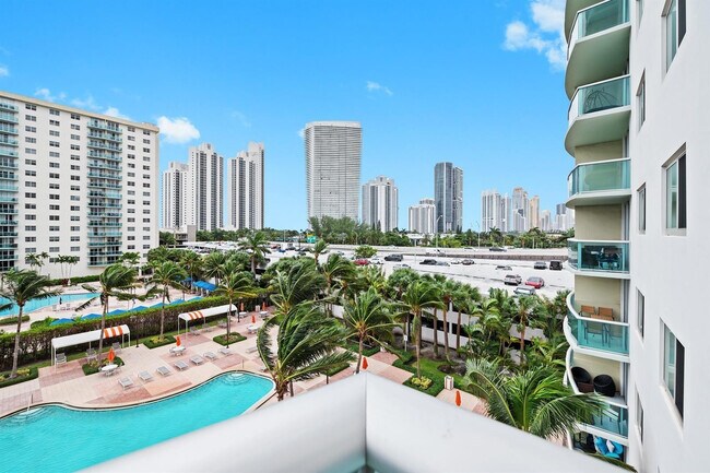 Building Photo - 19380 Collins Ave