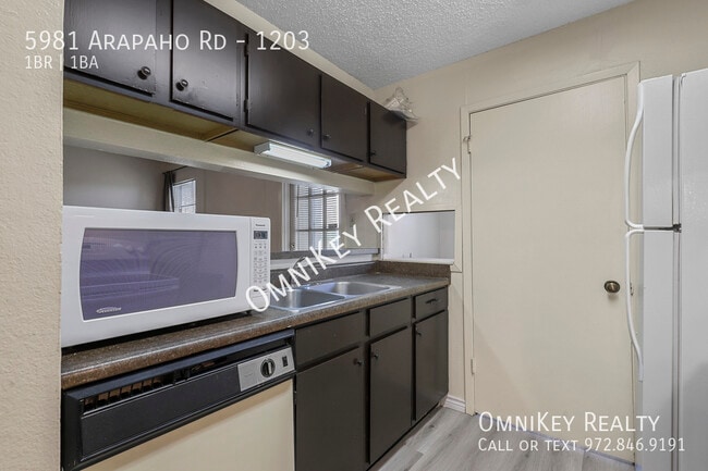 Building Photo - 5981 Arapaho Rd