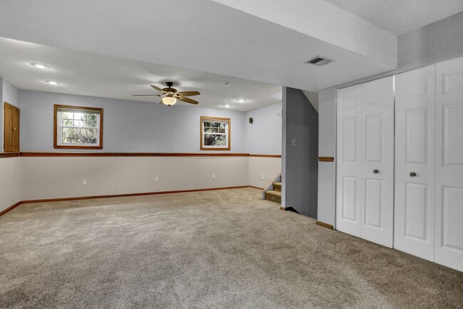 Building Photo - Spacious 4-Level Home with Deck, Workshop ...