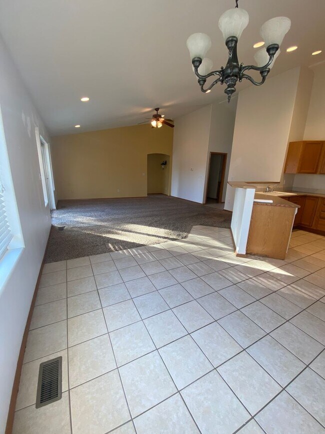 Building Photo - April Rent Free - House with Triple Car Garage