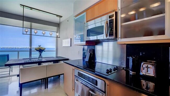 Building Photo - 6365 Collins Ave