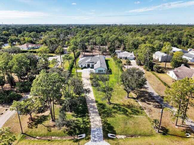 Building Photo - Brand-new contemporary estate on 2.27 private acres