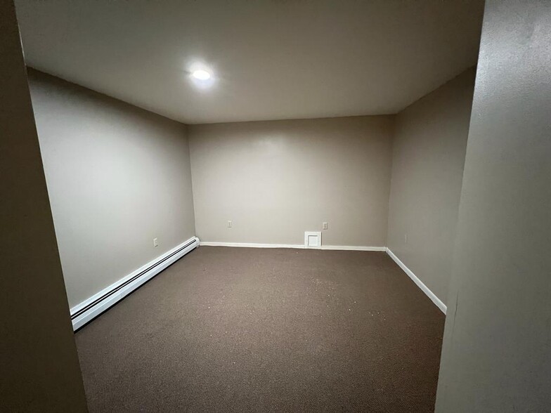 basement- updated carpet - 220 Mascoma St