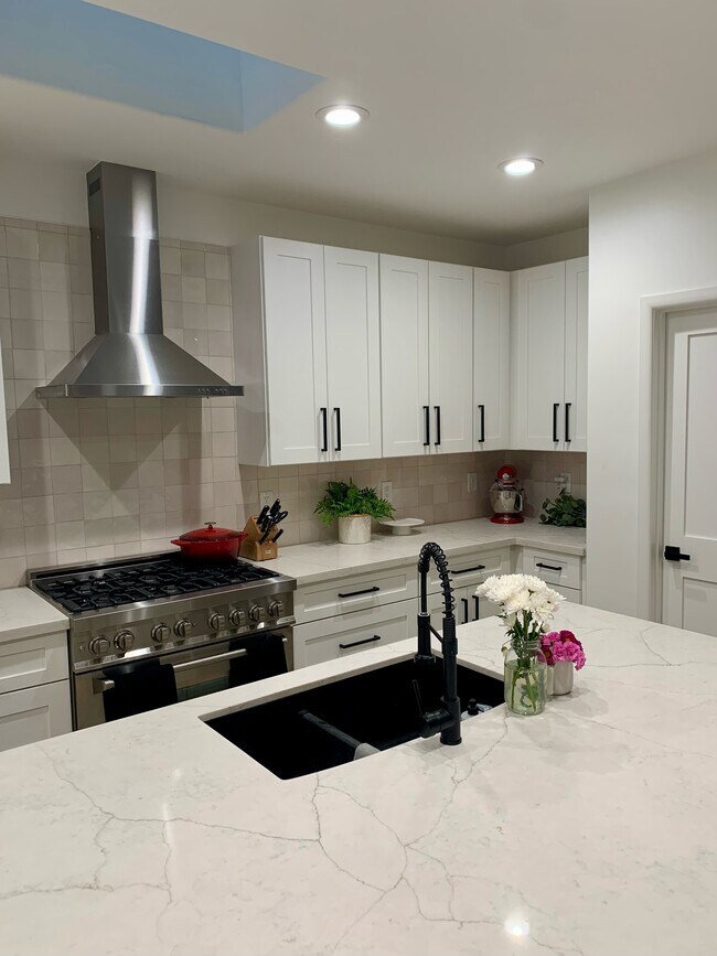Kitchen w/ Laundry Door - 2329 N Mitchell St