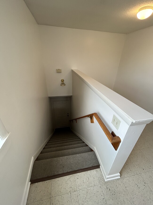 Stairway to private entry - 131 E Main St