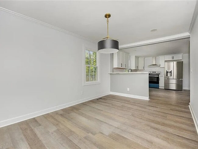 Building Photo - Earn Wealth While Leasing - Like a Homeown...