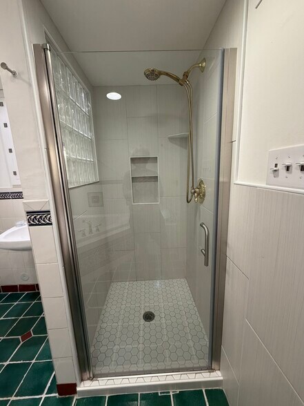 Brand new shower enclosure in basement bathroom - 508 Daly Ave