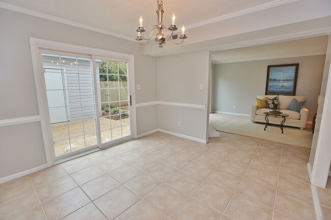 Building Photo - MUST SEE! Charming 3-Bedroom Townhome in Thoroughgood! 1-Car Attached Garage!